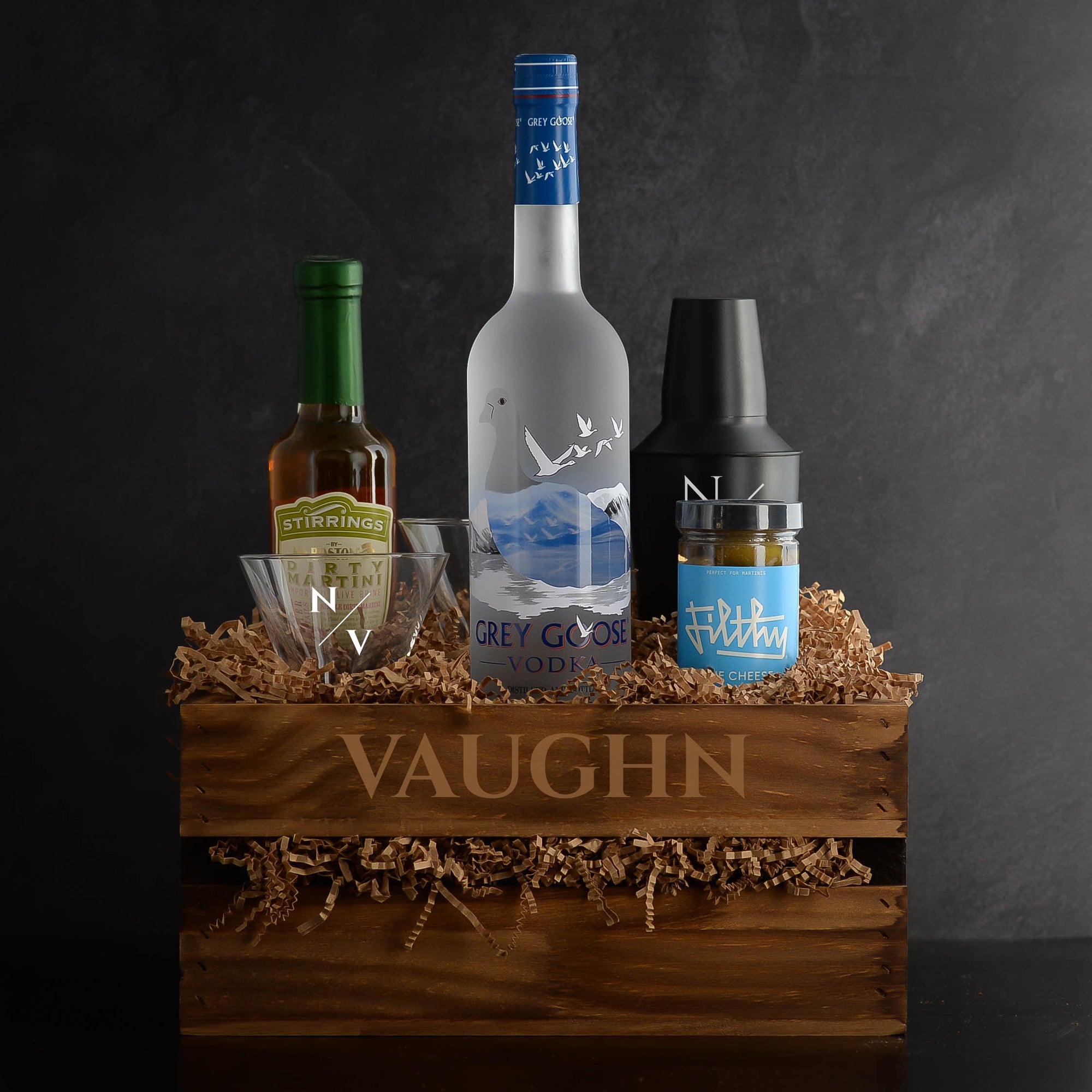 Grey Goose Vodka Martini Gift Set; comes with two stemless martini glasses, shaker, Stirrings Dirty Martini Olive Brine and Filthy Foods Stuffed Olives. Personalize for free. Fast Delivery.