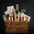 The Moscow Mule Gift Basket featuring Tito's Vodka and Stirrings Mule Cocktail Mixer. The gift set also includes a moscow mule recipe card, two mule mugs, and much more. It's the perfect moscow mule kit to enjoy at home or any celebration.