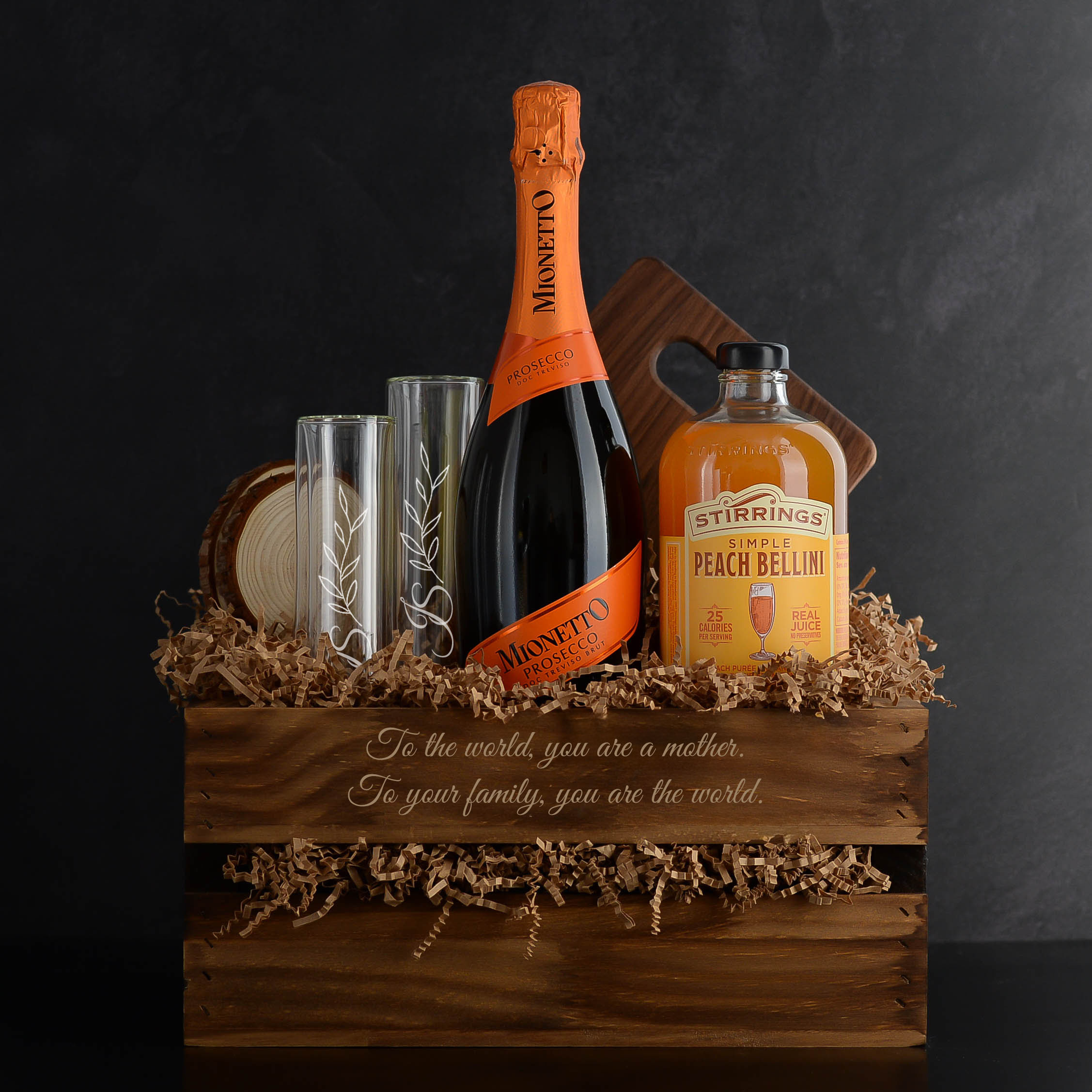 Mother's Day Wine Gift Basket, includes prosecco, bellini mixer, champagne flutes, coasters, and cutting board. Great Mother's Day gift idea.