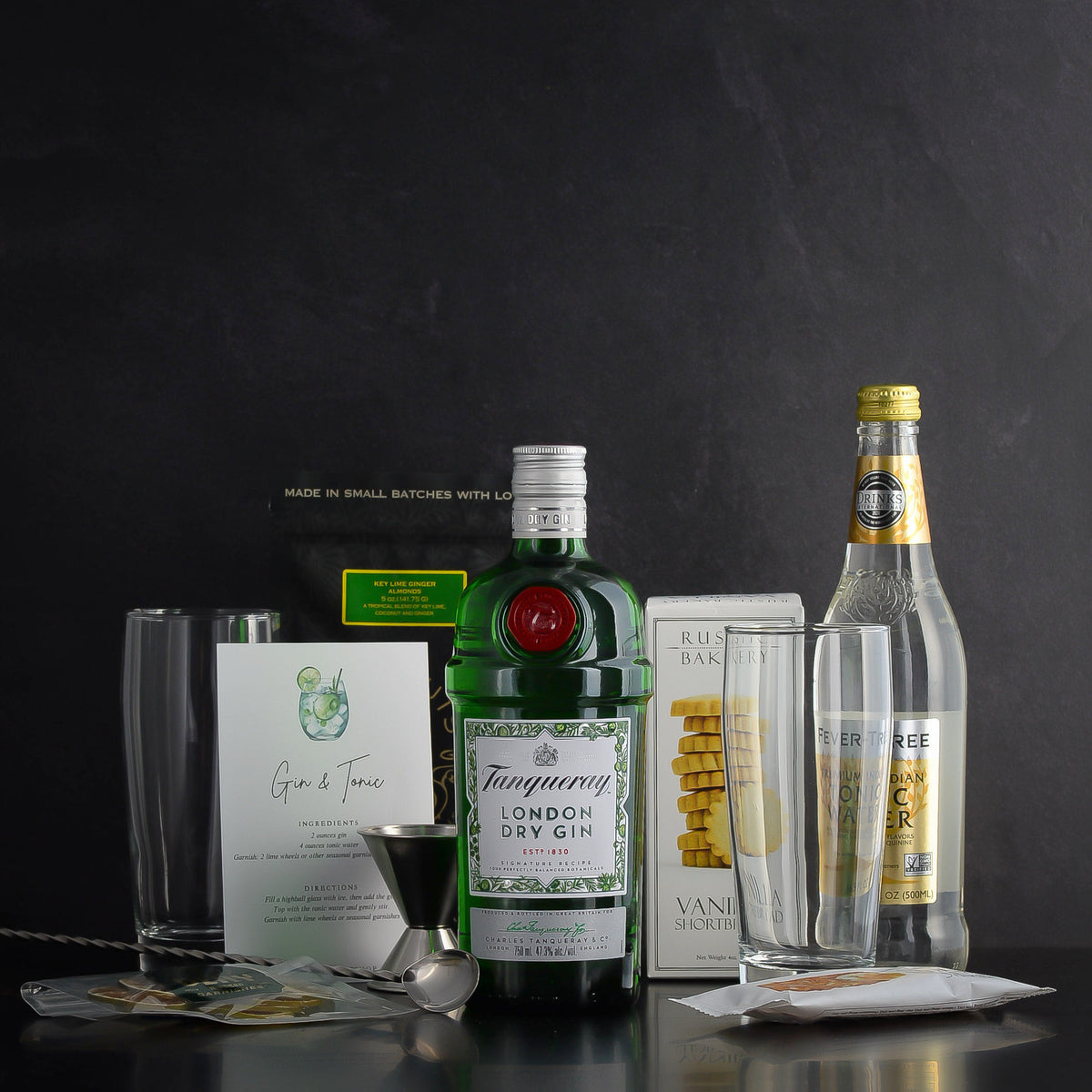 The best Tanqueray Gin and Tonic Gift Basket Set by Elevated Spirit Shop for gin lovers, birthdays, and corporate gifts